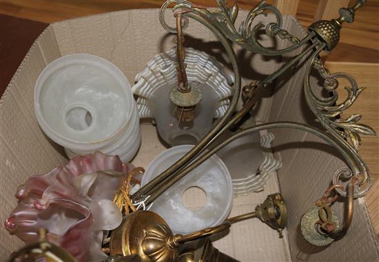 A brass light and shades